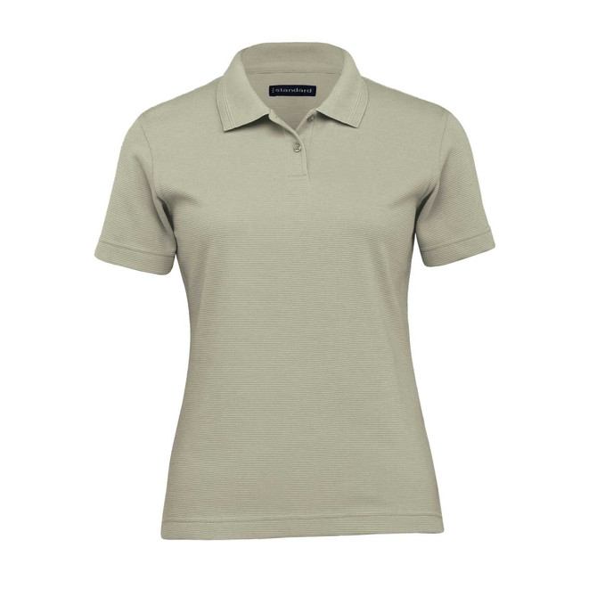A women's polo shirt in a light olive green colour with a classic collar and short sleeves. It features a logo.