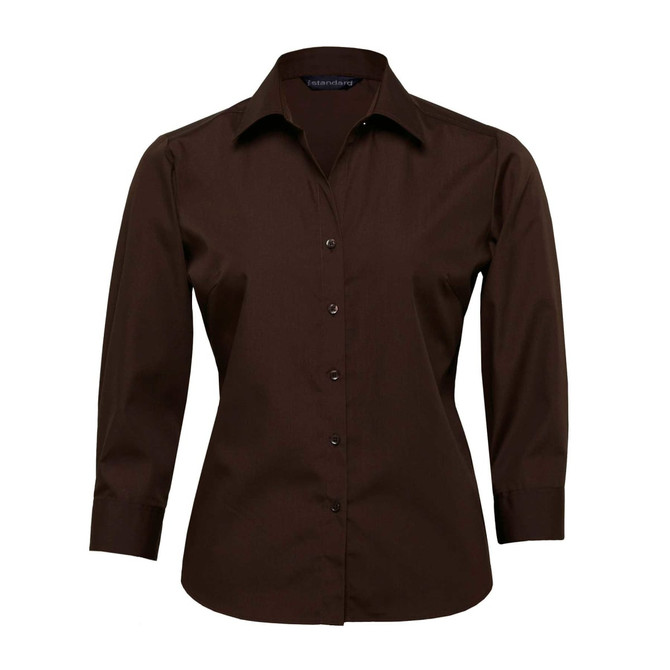 A brown button-up shirt for women featuring a collar and long sleeves, with a branding logo on the inside.