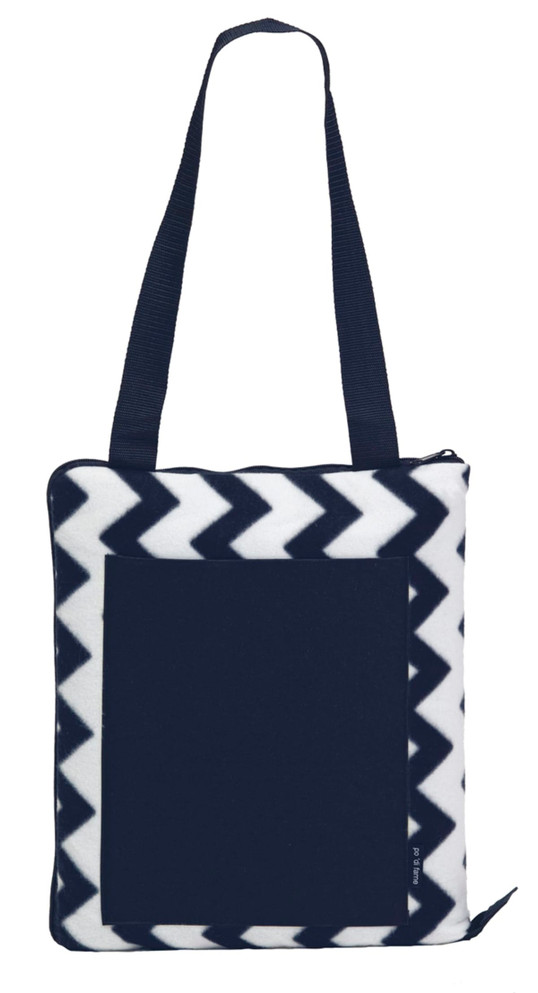 A navy and white chevron-patterned outdoor blanket with a zippered pocket and shoulder straps. It has a logo.