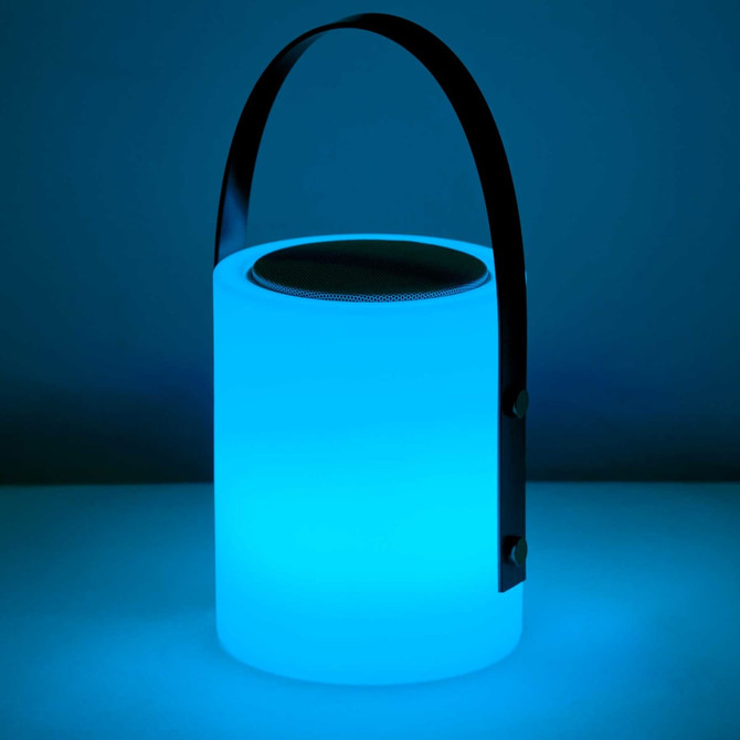 A blue twilight speaker lamp with a cylindrical design and a handle. It features a speaker on top.