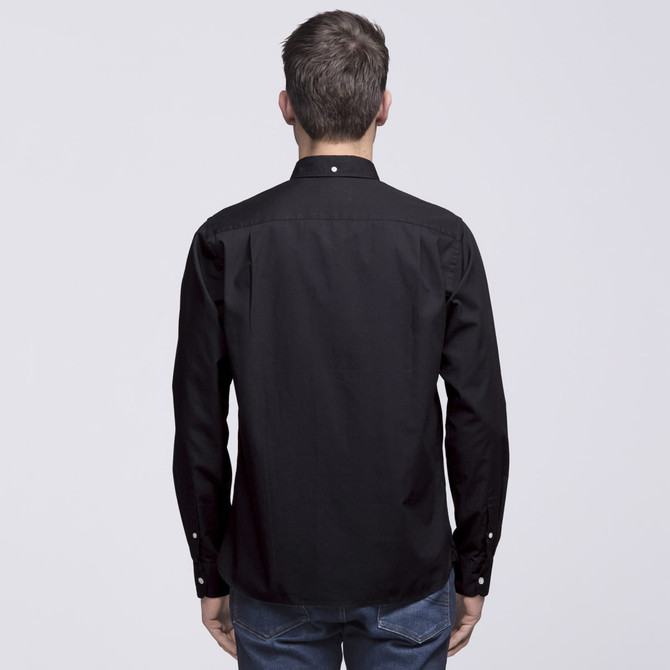 A black button-up shirt viewed from the back, featuring long sleeves and a collar. It has a small logo on the back.
