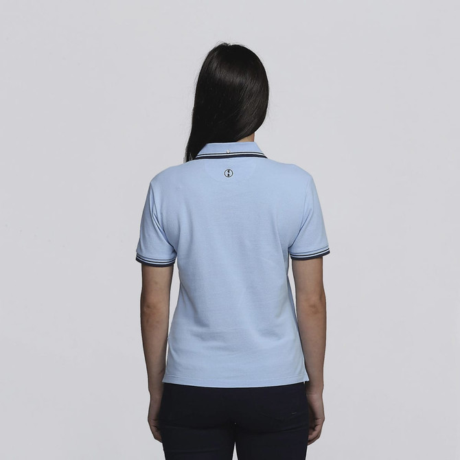 A light blue women's polo shirt featuring a collar and contrasting trim. The back view shows a logo on the upper neck area.