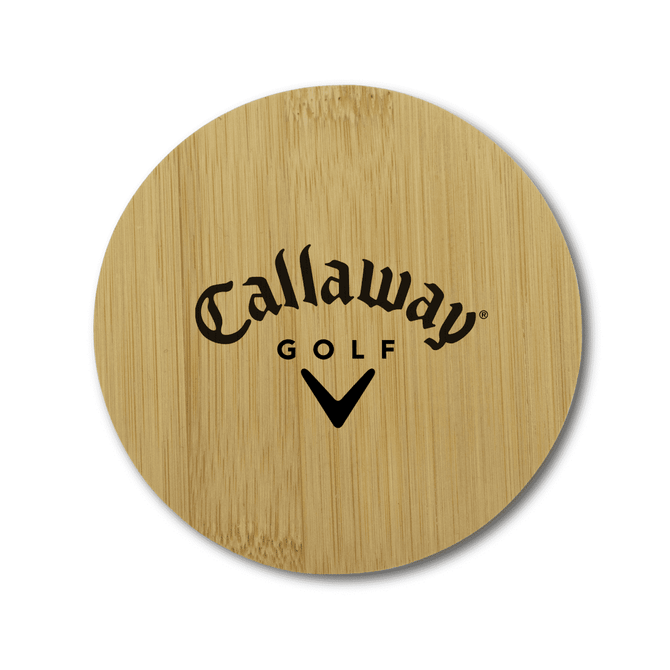 A round bamboo coaster featuring a branded logo in black against a natural bamboo background.