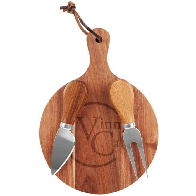 A round wooden cheeseboard features a logo and includes a cheese knife and fork with wooden handles.