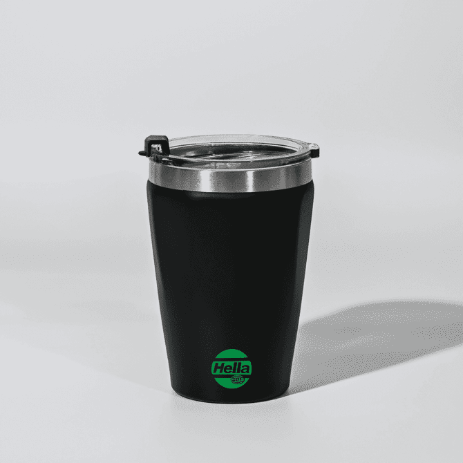 A black tumbler with a stainless steel rim and a lid, featuring a logo on the front.