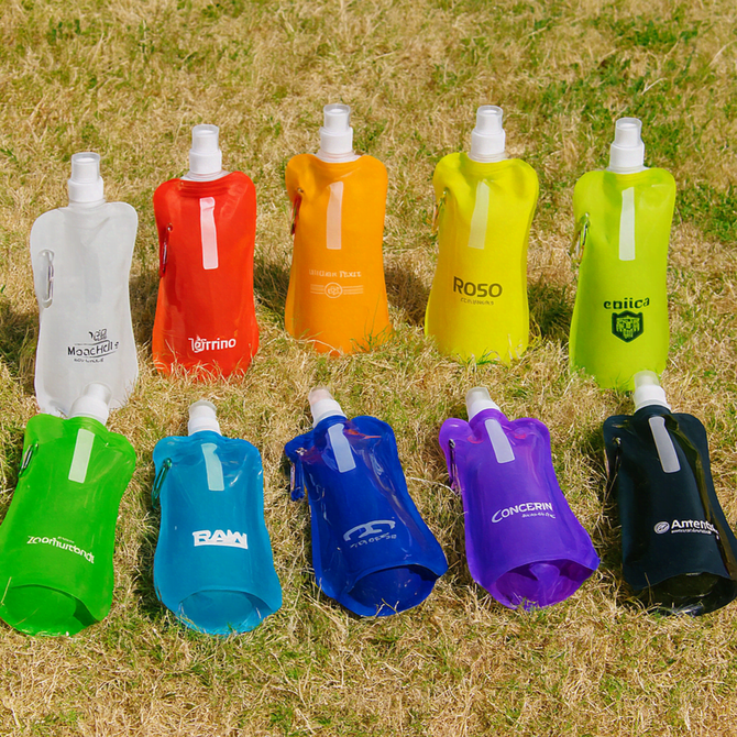 A collection of ten 500ml water pouches in various colours, each featuring a spout and some with logos.