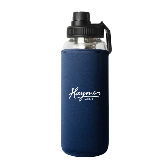 A drink bottle with a clear body and navy blue sleeve, featuring a black lid and a logo.