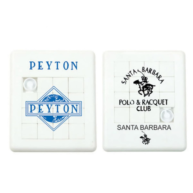A white puzzle featuring a geometric design and text, with blue accents and a logo on one side.