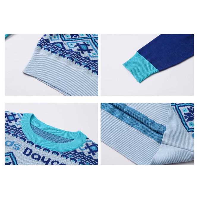 A unisex sweater featuring a blue and turquoise jacquard pattern with ribbed cuffs and hem. Includes a logo.