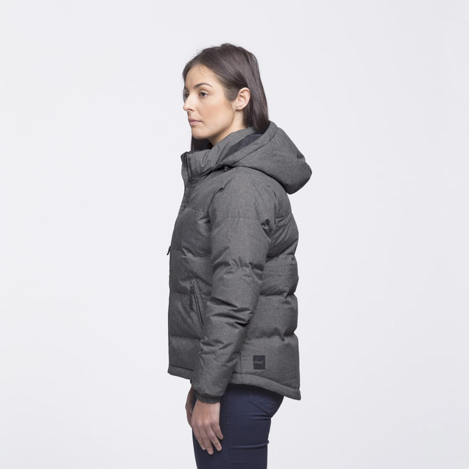 A grey puffer jacket with a hood, featuring a logo, worn by a model in profile.