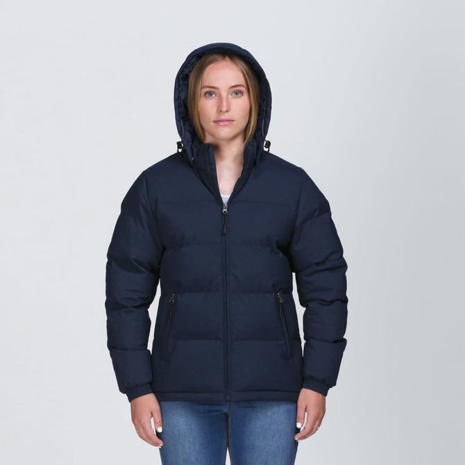 A navy blue puffa jacket with a hood, featuring zippered pockets and a branding logo.