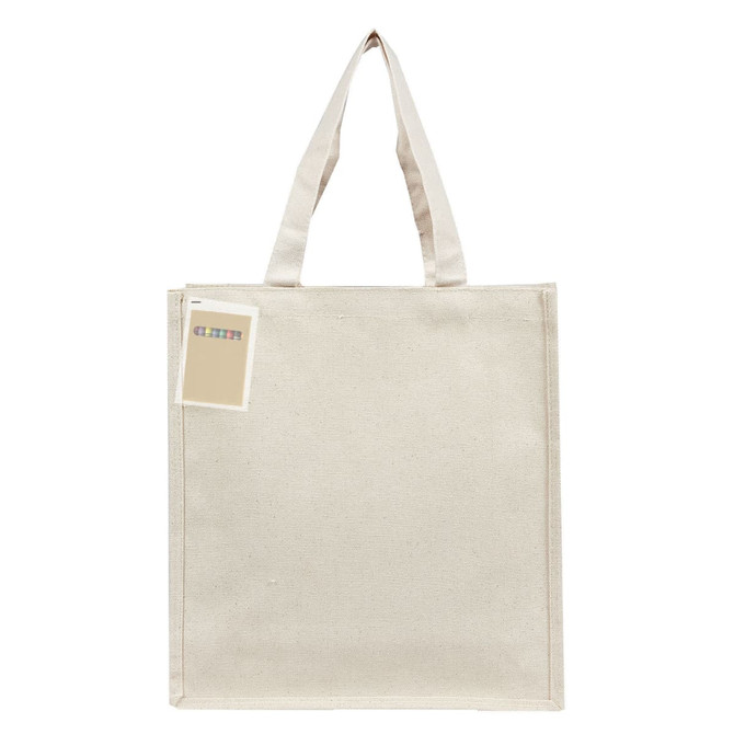 A cream-coloured tote bag with long handles, featuring a tag and a logo on the front.