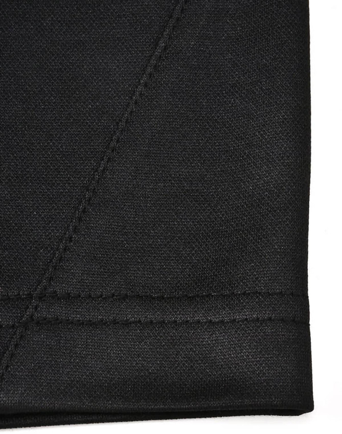 A close-up of a black polo shirt featuring a smooth fabric texture and detailed stitching.