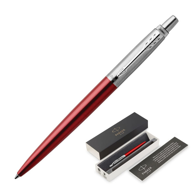 A metal ballpoint pen in Kensington Red with a silver detailed clip, presented in a black box with a branding logo.