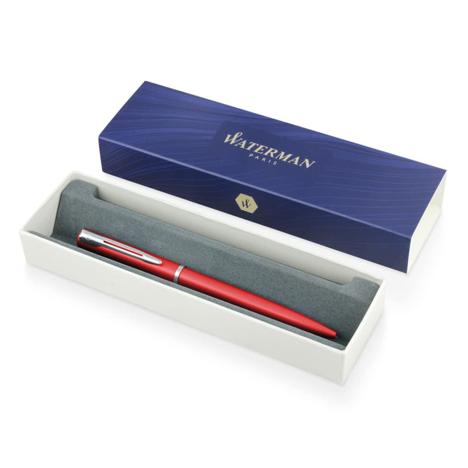 A red ballpoint pen in a fitted box with a grey interior, featuring a logo on the lid.