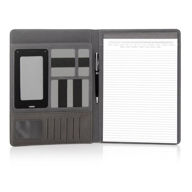 A grey executive notebook cover with multiple pockets, slots for cards, a pen, and lined paper.
