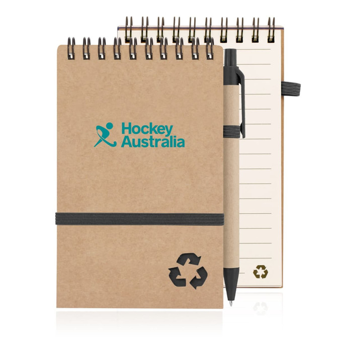 A spiral-bound notepad made from recycled paper with a brown cover and a black elastic band, accompanied by a pen.