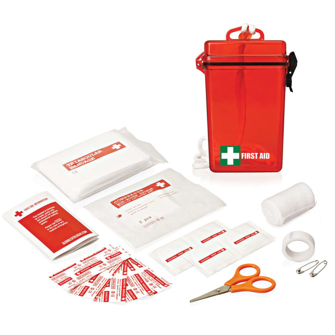 A red waterproof first aid kit containing bandages, gauze, scissors, tape, and safety pins, all neatly organised.