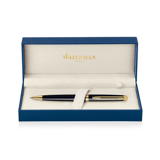 A black ballpoint pen with gold trim, displayed inside a blue box with a soft interior, featuring a logo.