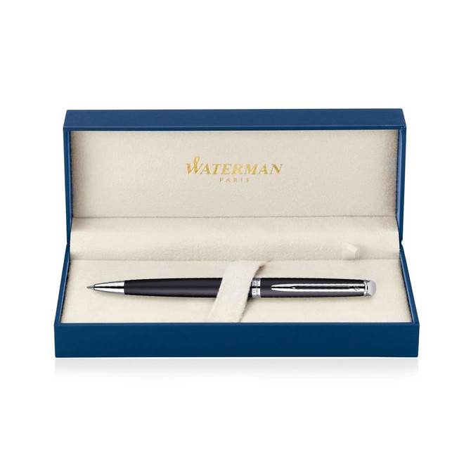 A matte black ballpoint pen in a blue presentation box with a soft interior and a logo.