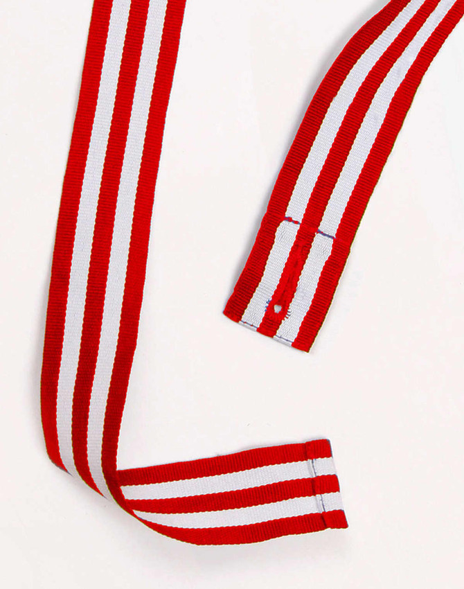 Red and white striped apron straps featuring a logo and finished ends.