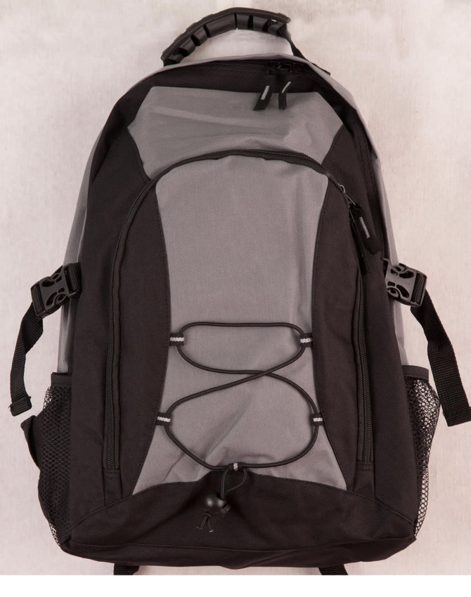 A grey and black backpack with exterior mesh pockets and bungee cord detailing. It features a logo on the front.