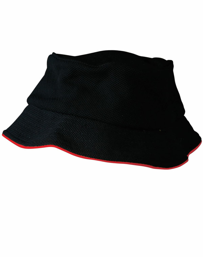 A black bucket hat with a contrasting red trim, featuring a textured mesh design and a logo.