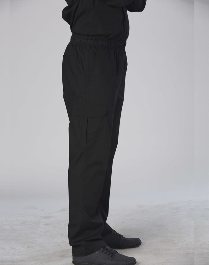 Black chef pants with an elastic waistband and cargo pockets, fitted on a model standing sideways.