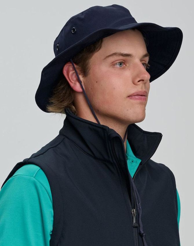 A blue surf hat with a wide brim and a clip-on chin strap, featuring a logo on the side.
