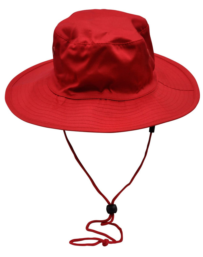 A red surf hat with a wide brim and a clip-on chin strap, featuring a logo.