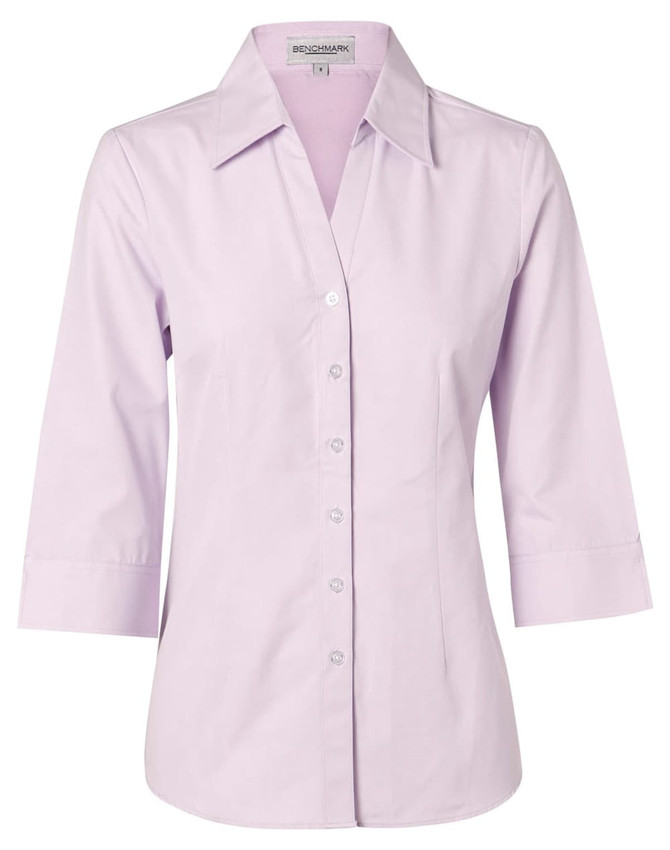 A lilac button-up shirt featuring a collar and 3/4 sleeves, with a logo on the label.