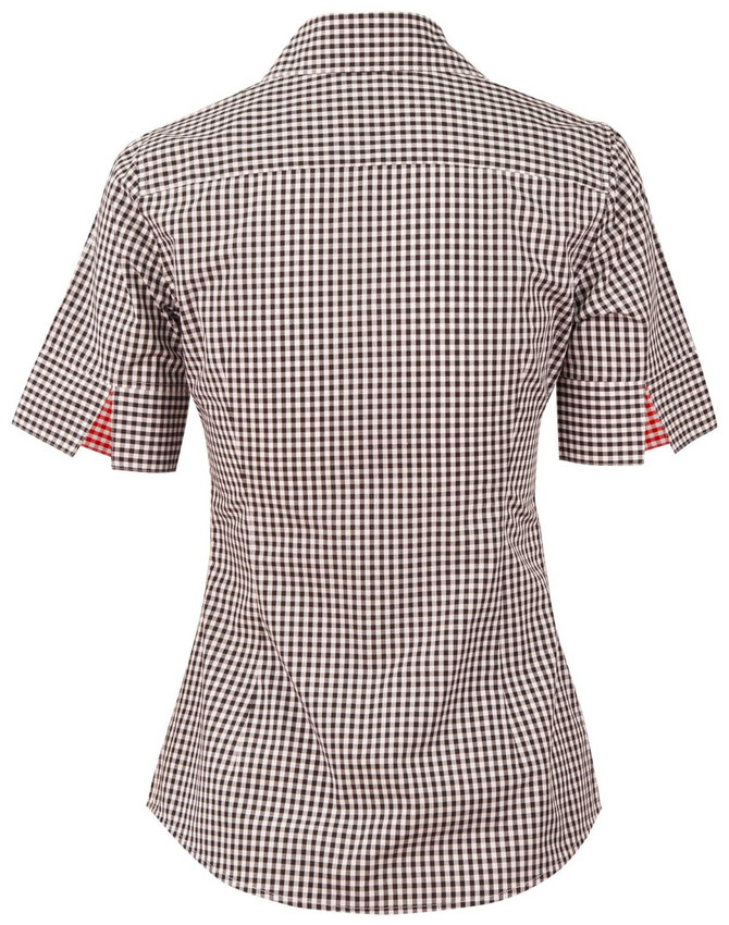A short-sleeved women's button-up shirt in black and white gingham check with a red pattern on the sleeves. It features a logo.