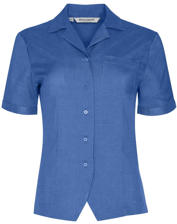 A blue short sleeve overblouse with a collar and a single chest pocket, featuring buttons down the front and a logo.