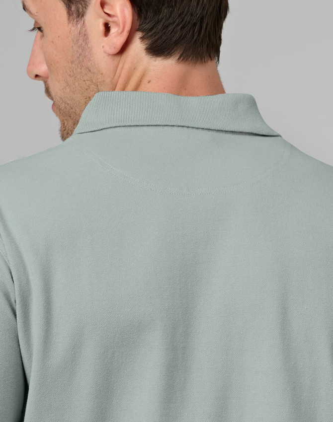 A men's cotton stretch polo shirt in a soft green colour, featuring a classic collar and logo detail.