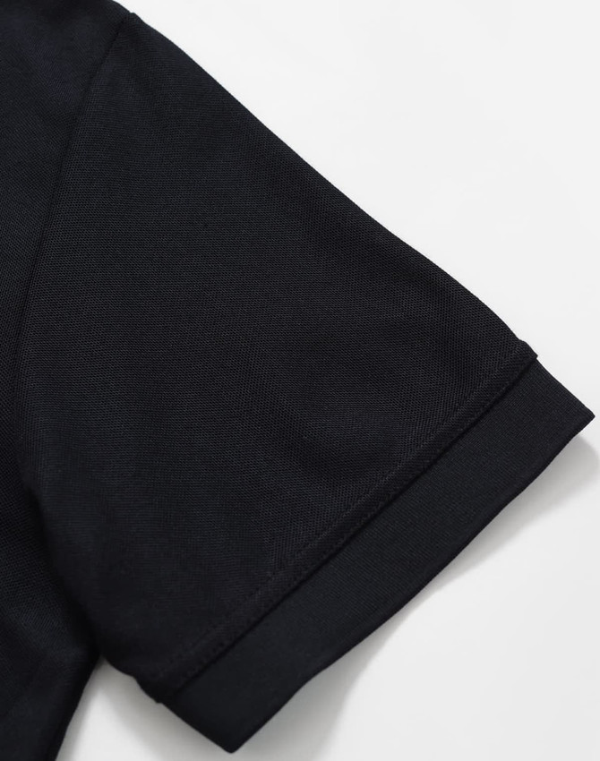A black polo shirt with a solid design, featuring short sleeves and a classic collar. Includes a logo.