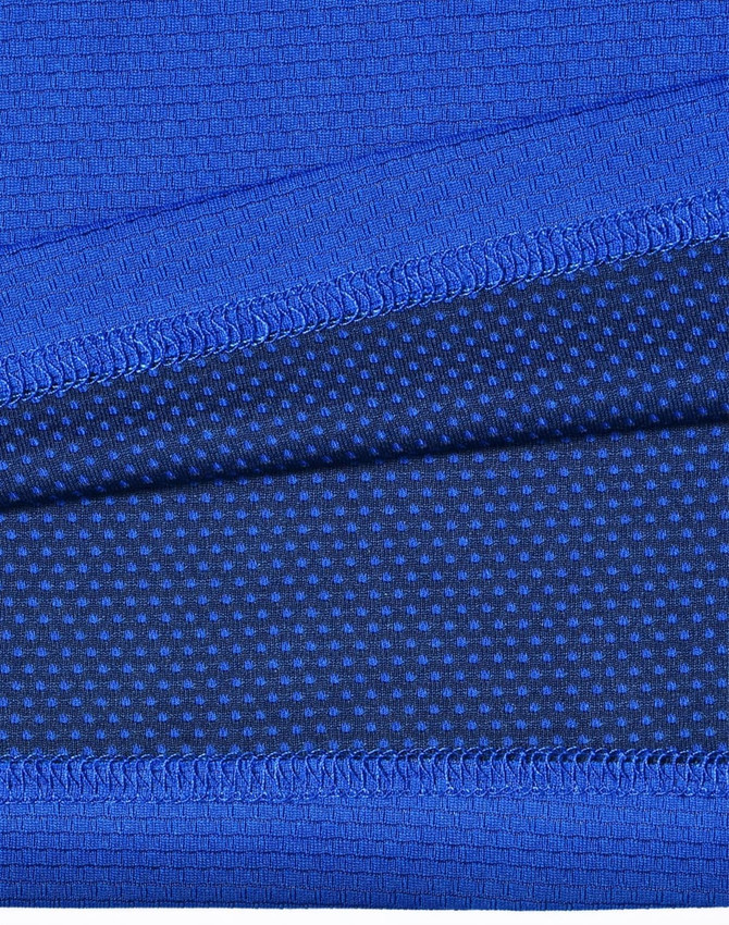 A close-up of blue bamboo charcoal fabric with textured patterns and a visible logo.