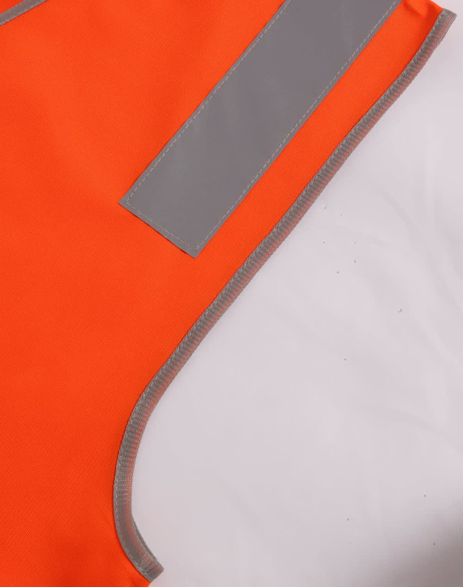 An orange safety vest featuring grey shoulder reflective tape and a grey trim. It has an included branding logo.