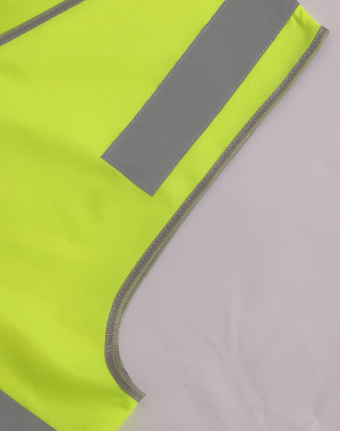 A bright yellow safety vest featuring reflective shoulder tapes and a logo.