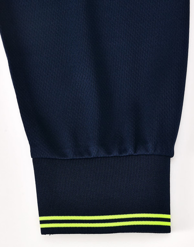 A navy blue long-sleeve polo shirt featuring a ribbed cuff with yellow and green stripes, and a logo.