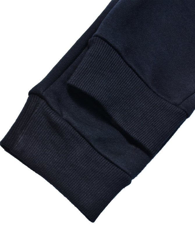 Navy blue kids' poly/cotton terry sweat pants featuring ribbed cuffs and a simple, classic design.