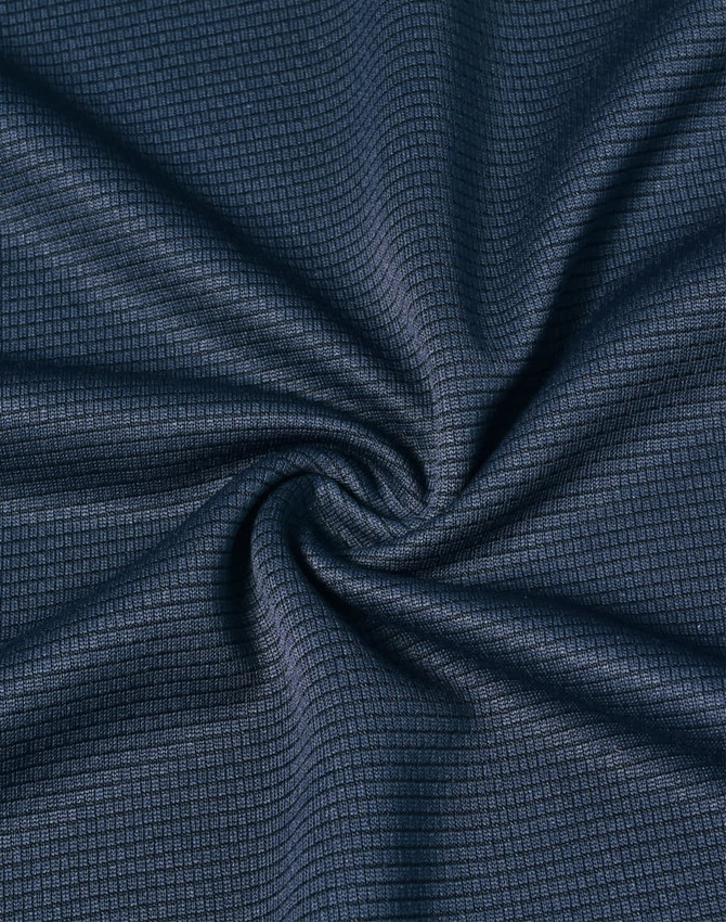A close-up of a dark navy fabric with a subtle grid pattern, showcasing its lightweight texture.