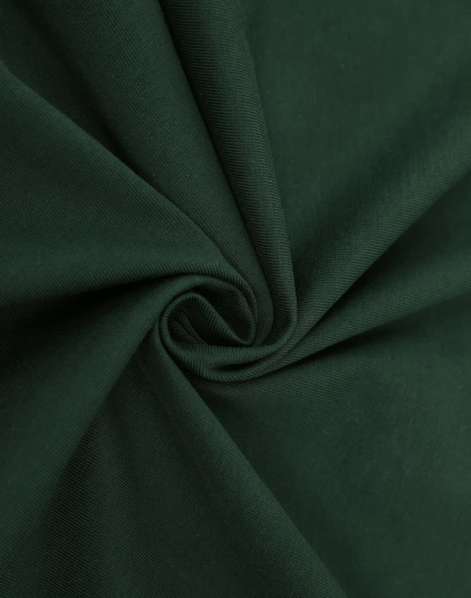 A close-up of dark green fabric displaying a smooth texture, ideal for T-shirts. The material has a subtle stretch.