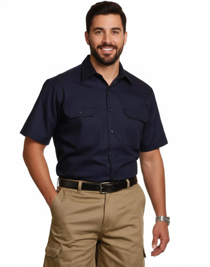 A navy short-sleeved cotton work shirt with two chest pockets, worn by a smiling man.