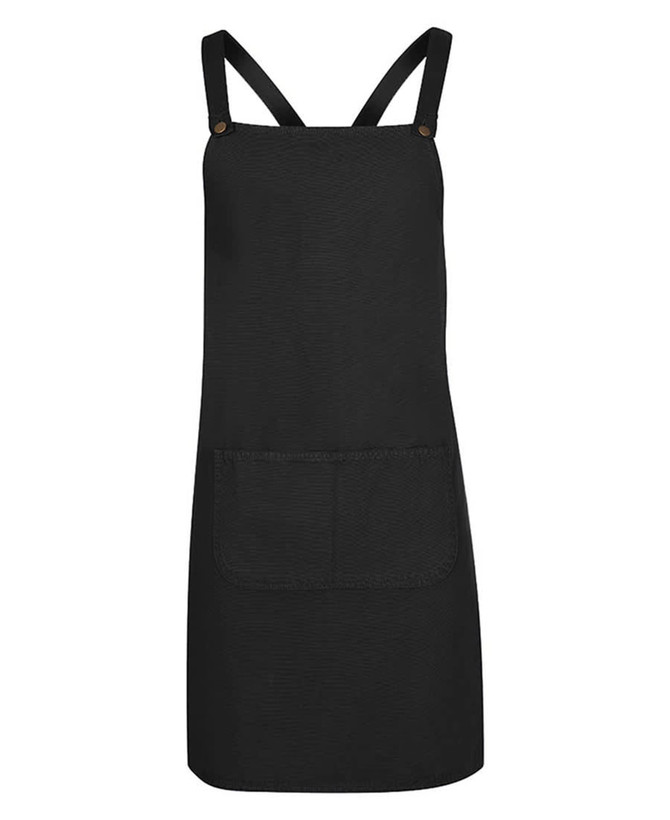 A black canvas apron with cross back straps and a front pocket, featuring a logo.