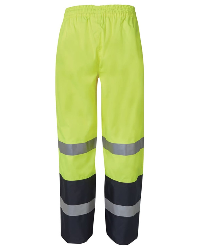 Premium rain pants in bright yellow with reflective grey stripes, featuring an elastic waistband and black lower sections.