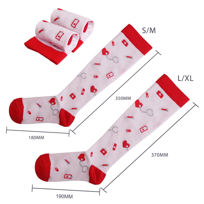 Compression socks in white with red accents, featuring medical-themed patterns. Two pairs are folded beside them.