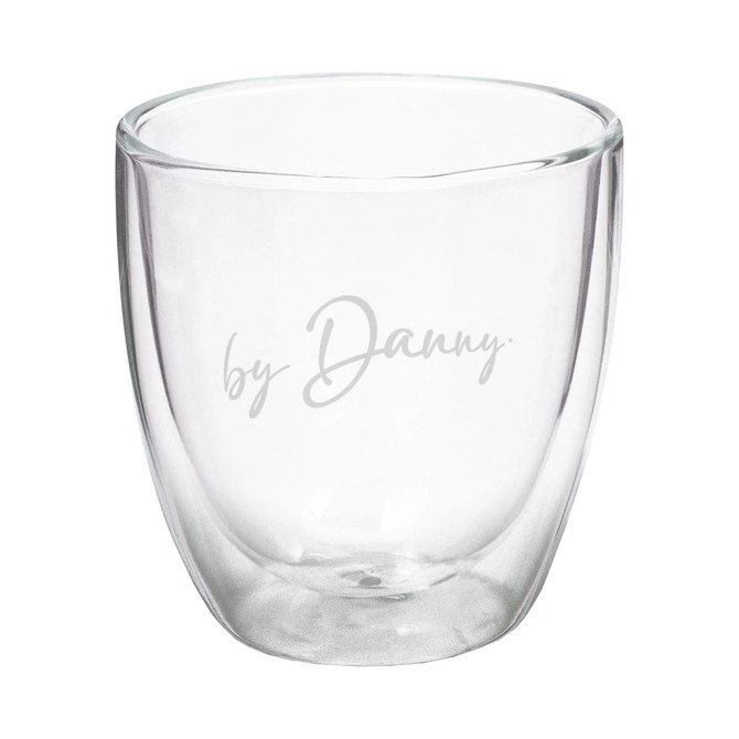 A double wall glass featuring a clear design with a subtle branding logo. Holds 340ml of liquid.