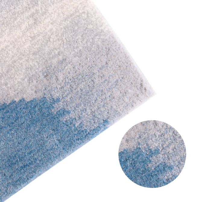 Acrylic fibre logo mat featuring a gradient design in shades of grey and blue. Includes a close-up texture detail.