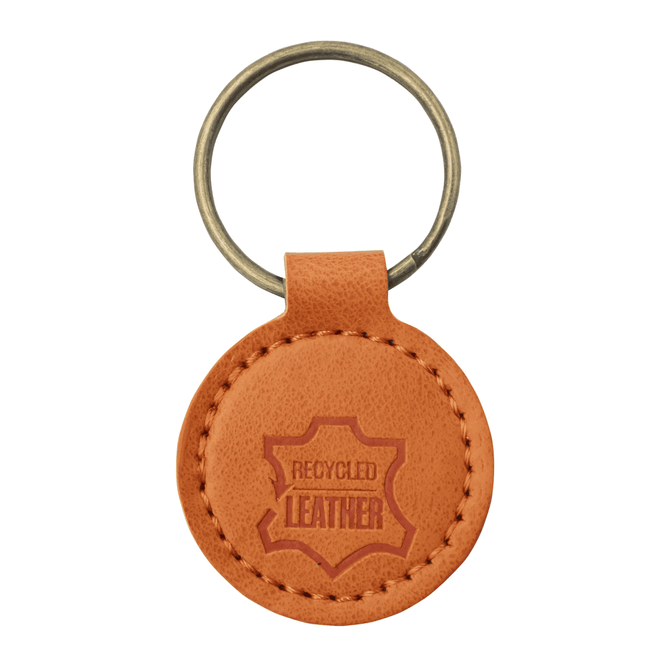 A round, tan recycled leather keyring attached to a metal ring. Features a logo.