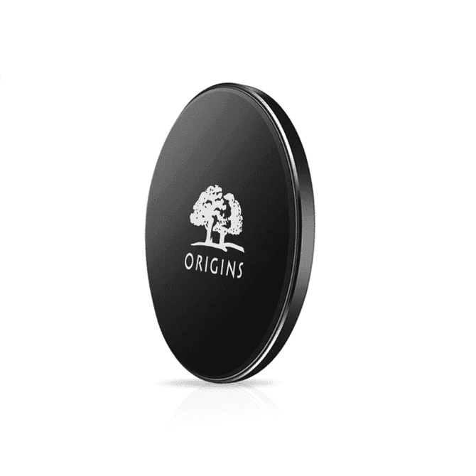A black QI wireless charger with a circular design and a logo featuring a tree.